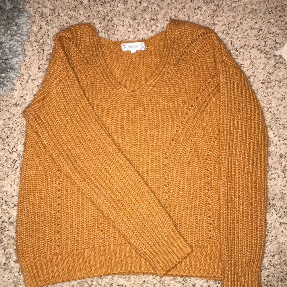 Dark orange sweater